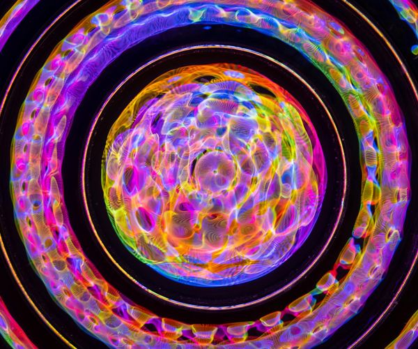 Neon cyan circle representing focus and concentration